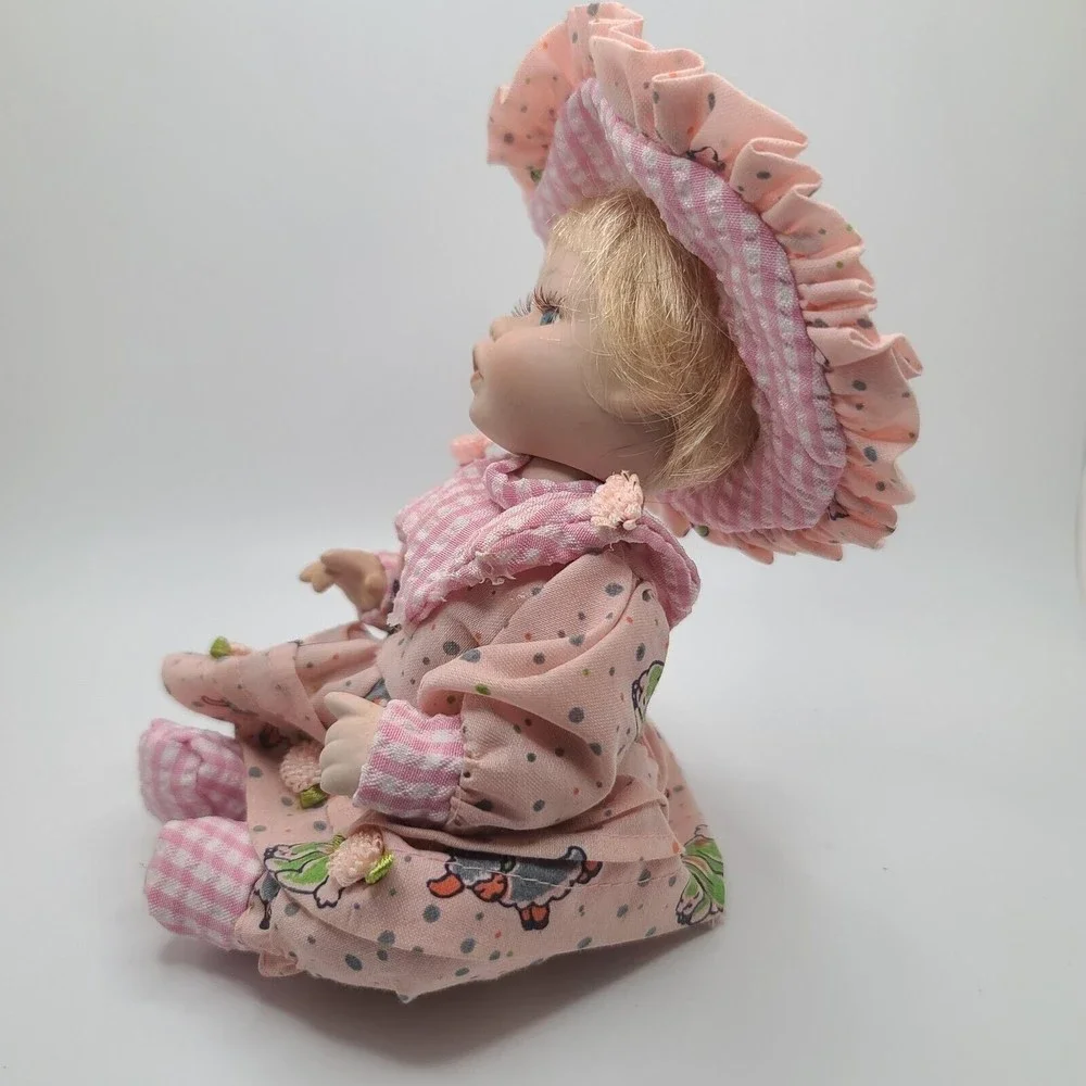 Realistic Looking Blonde Hair Blue Eyed Sitting Baby Doll